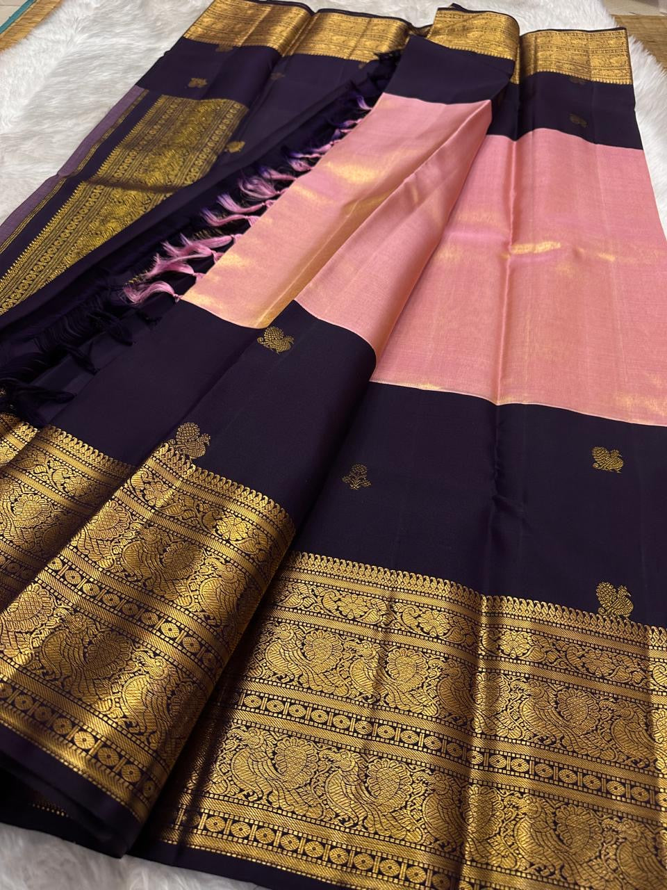 Rose milk pink pure tissue silk Kanchipuram saree with a purple border