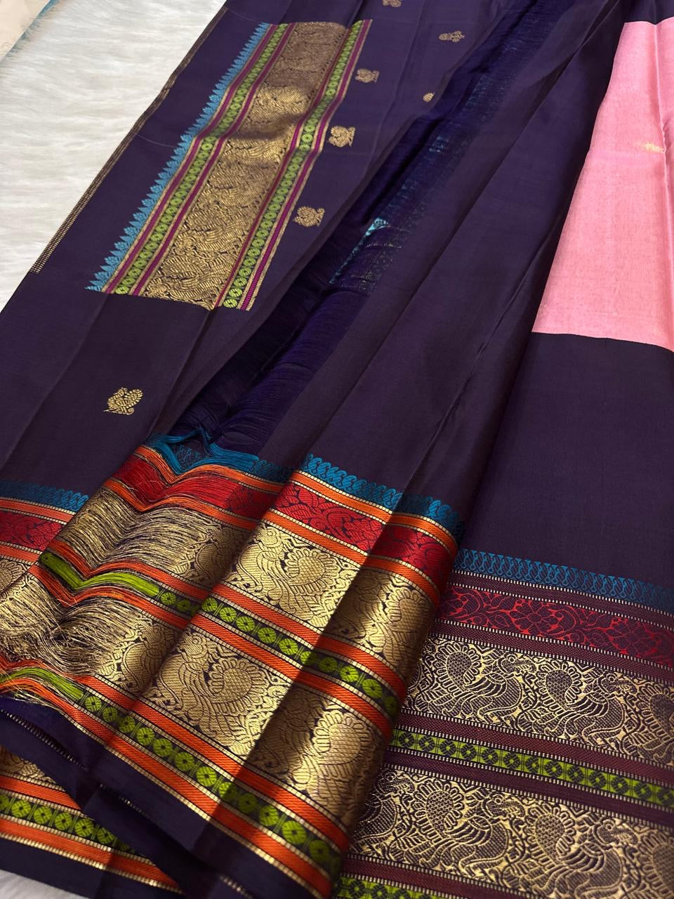 Handwoven Annapakshi gold zari buttas on rose tissue Kanjivaram silk