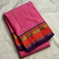 Rose pink Pure Silk Kanjivaram saree draped, showing the zari-woven kamalam buttas