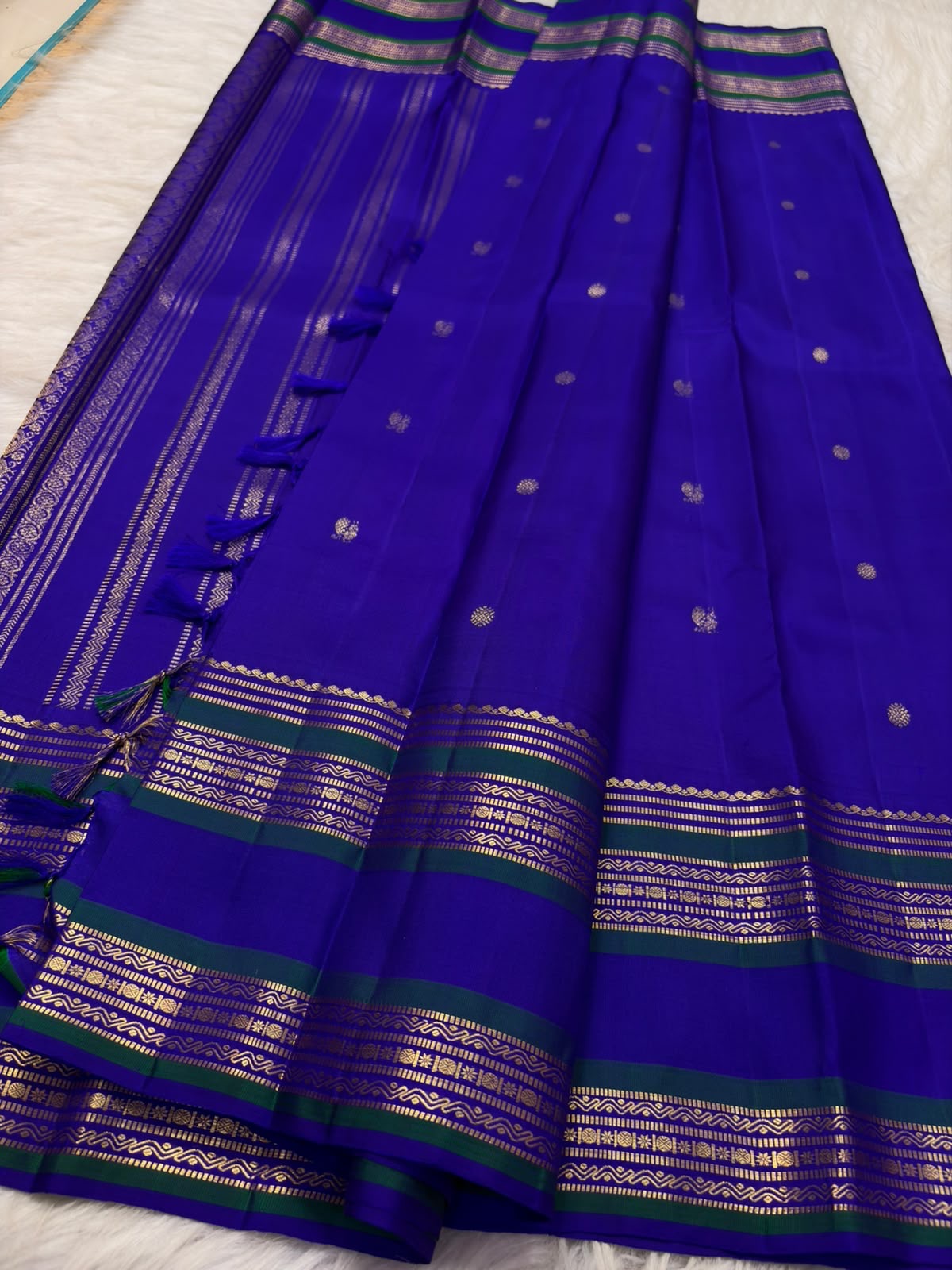 Radiant Neelam Blue Handwoven Pure Silk Kanchipuram Varisaipet Saree with Zari Mayil Chakram Buttas