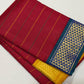 Red Kanchi Pattu Korvai saree with peacock blue border and Veldhari weave