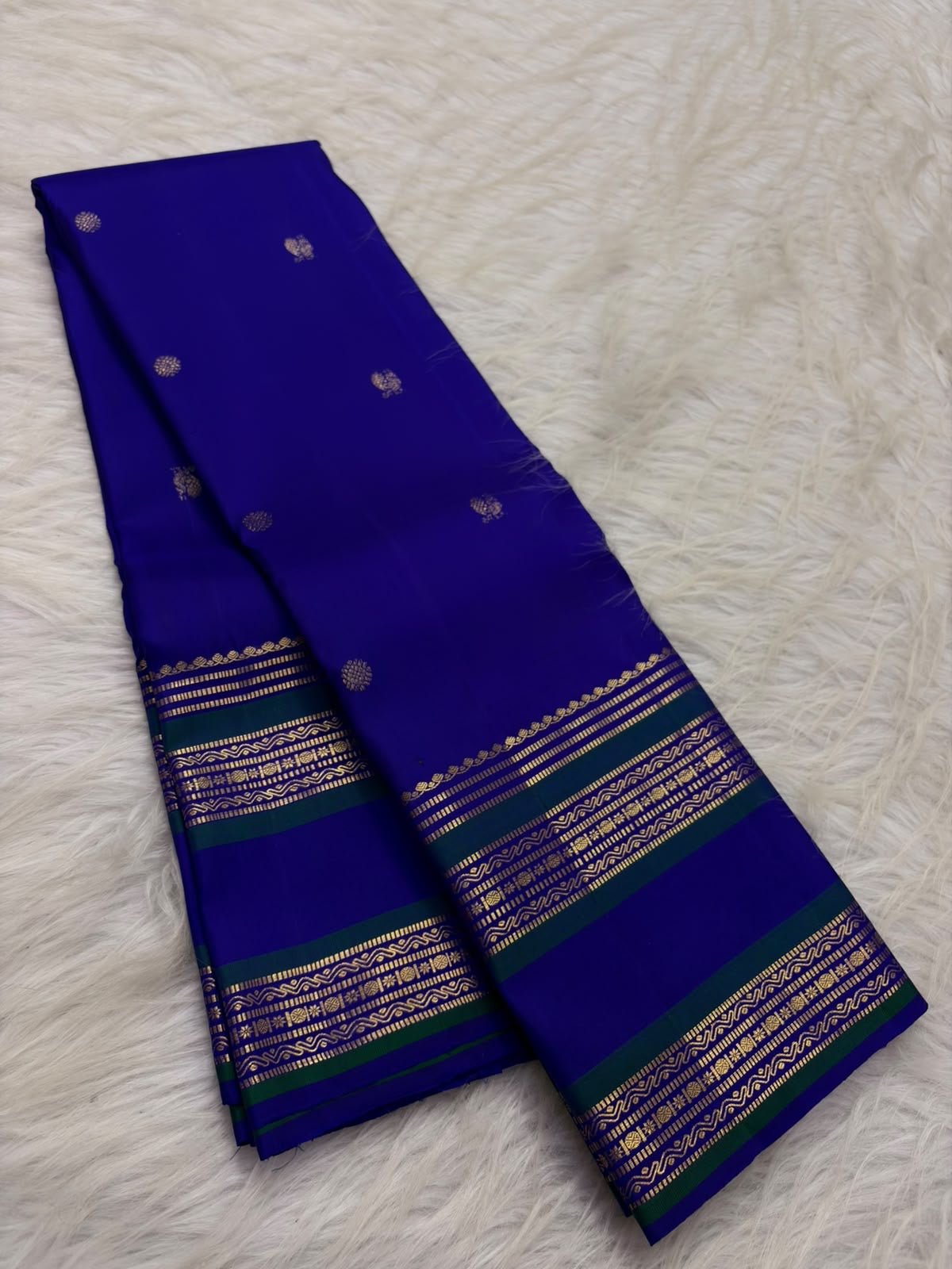 Radiant Neelam Blue Handwoven Pure Silk Kanchipuram Varisaipet Saree with Zari Mayil Chakram Buttas