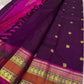 Royal aubergine Kanjipuram silk saree folded, Rettapet border and pallu visible