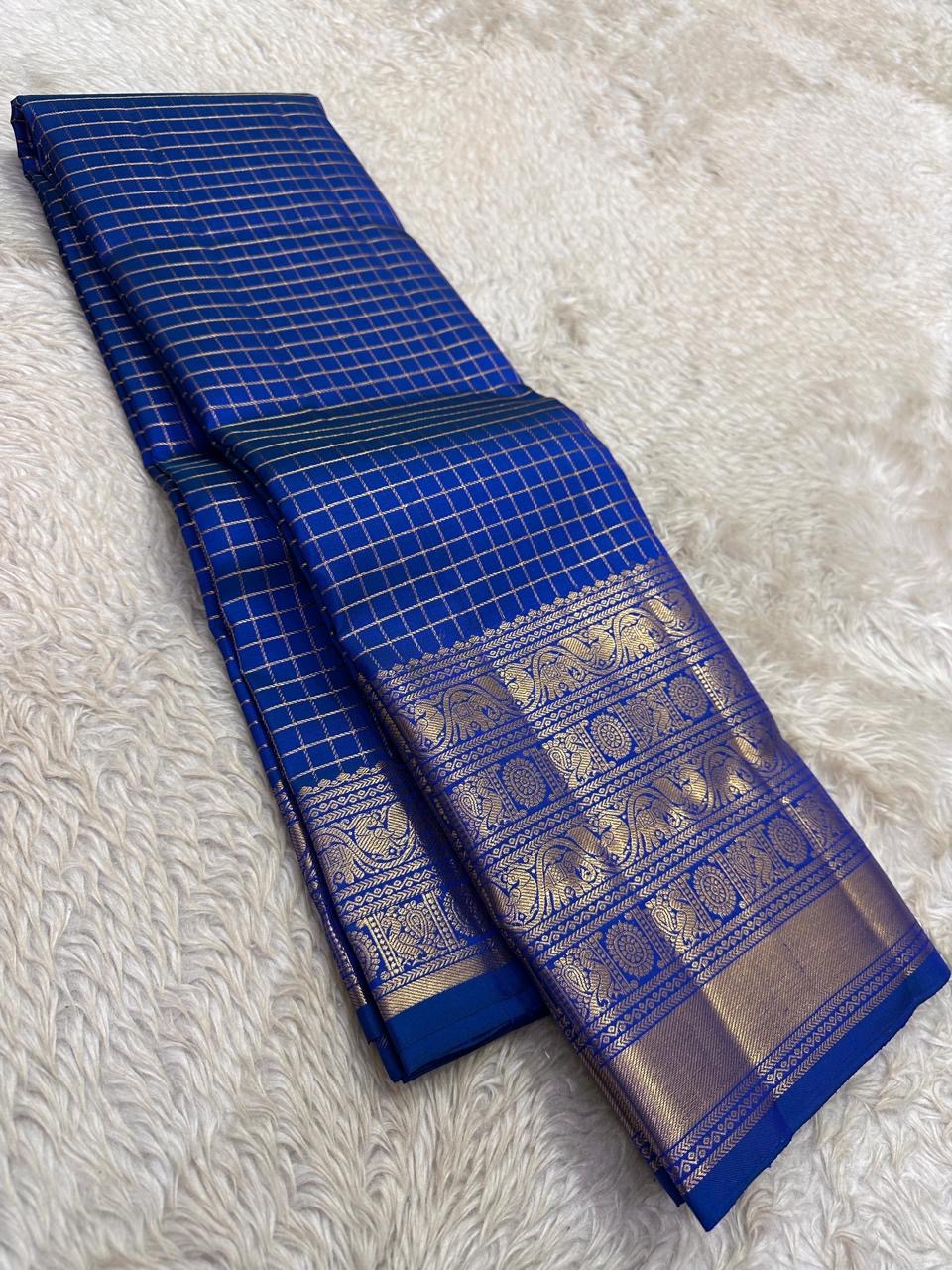Royal Azure Blue Kanjipuram silk saree, elephant and chakram zari motif close-up — Idam Living