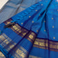 Royal azure blue Kanchipuram silk saree with purple border, close-up