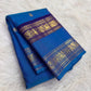 Royal azure blue Rettapet Kanjivaram saree with silver zari buttas, full view