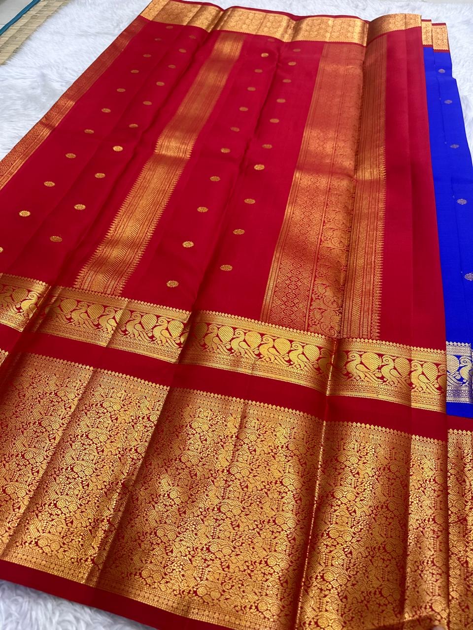 Gold zari stylized bird border on Royal Blue pure silk Kanjivaram saree.