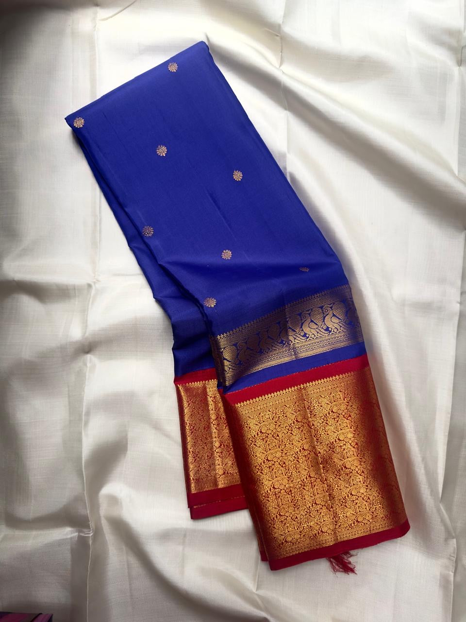 Royal Blue pure silk Kanjivaram Korvai saree with Arakku Red gold zari border.