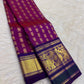 Detail of the royal blue border on the Vadamalli magenta Kanchipuram Butta saree