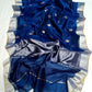 Close-up of silver floral details on blue Chanderi silk