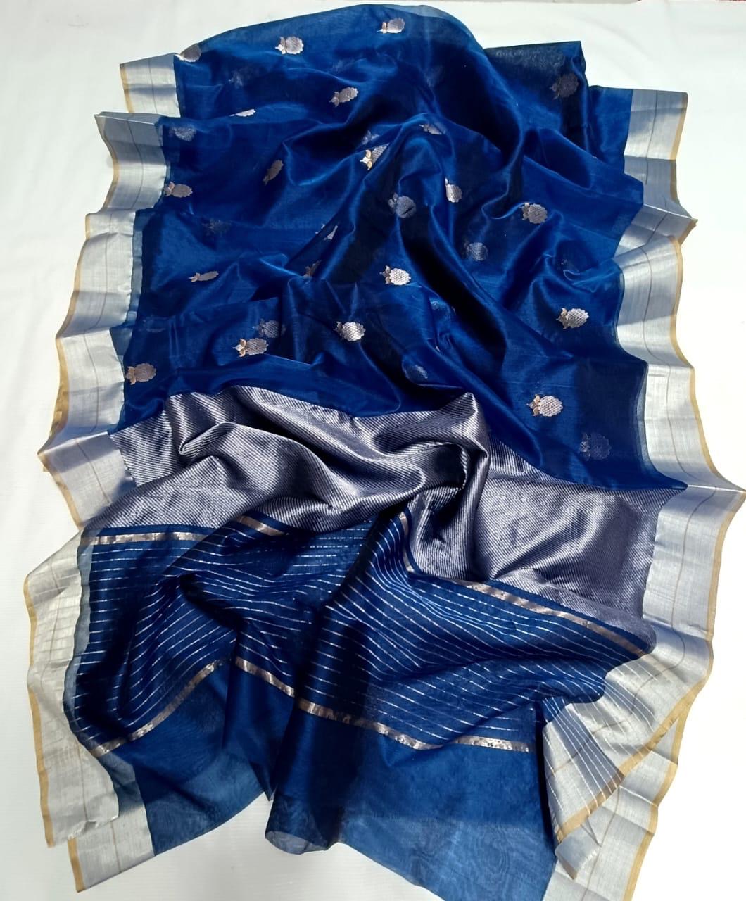 Close-up of silver floral details on blue Chanderi silk