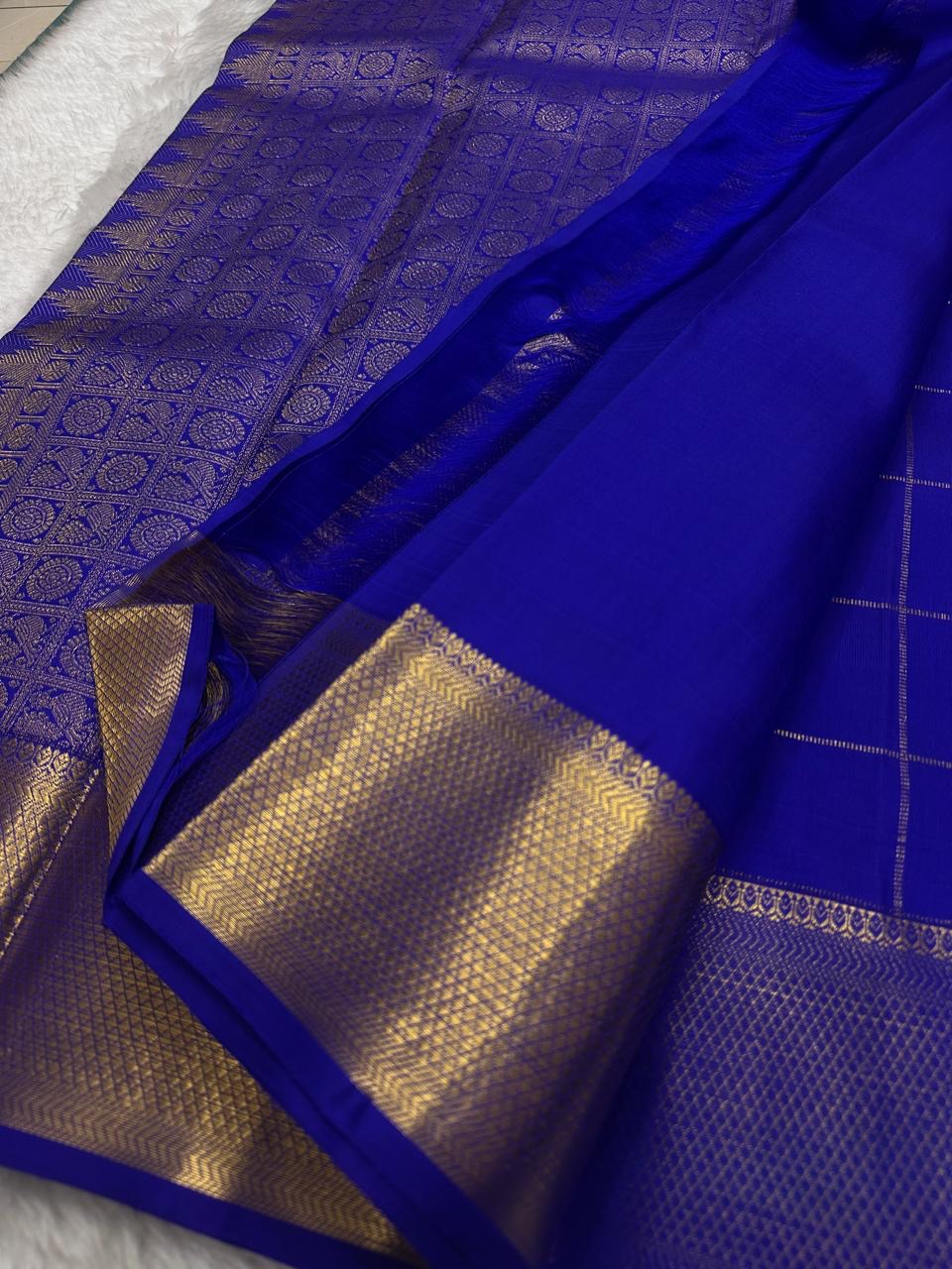 Royal Blue Gandaberunda Zari Kattam Kanjivaram saree styled to show the grand woven pallu.