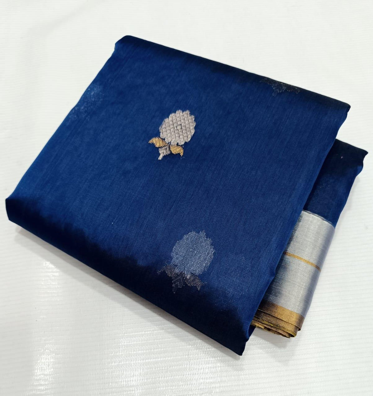 Deep blue handwoven Chanderi silk saree with floral motifs
