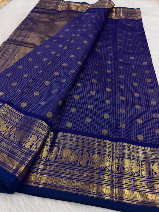 Royal blue Kanchipuram saree with Mayil zari border