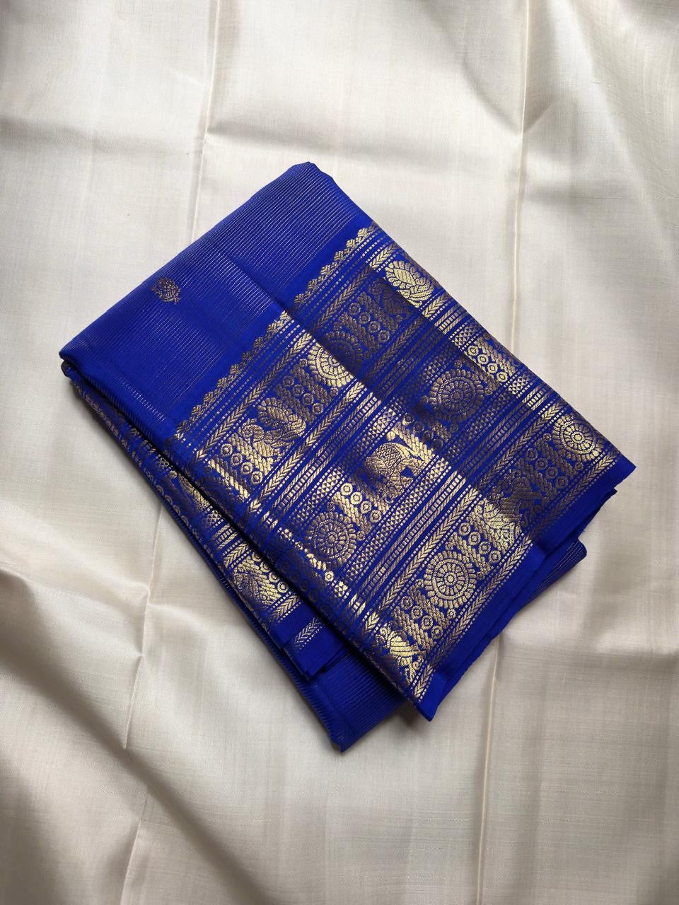 Kanjivaram vairaoosi saree in royal blue with Mayil Chakram buttas