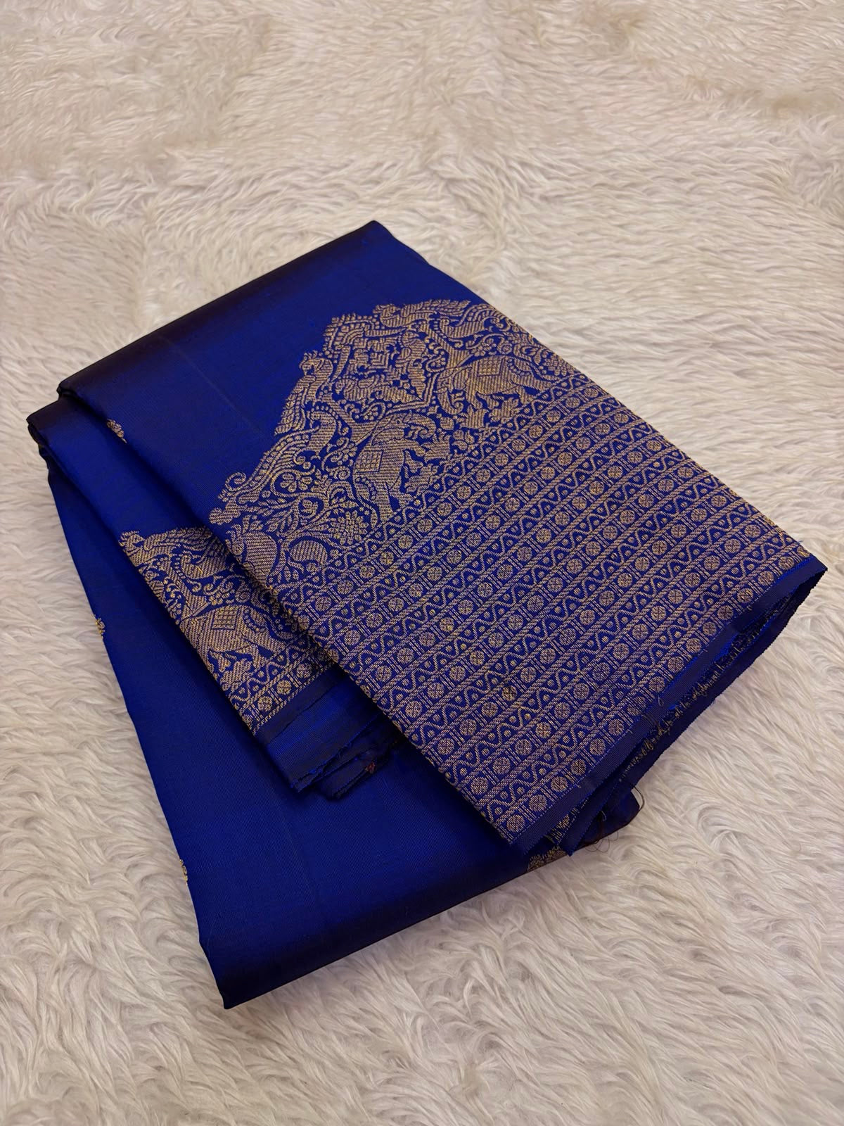Gaja-Yali border detail on Royal Blue Kanchi Pattu pure silk saree