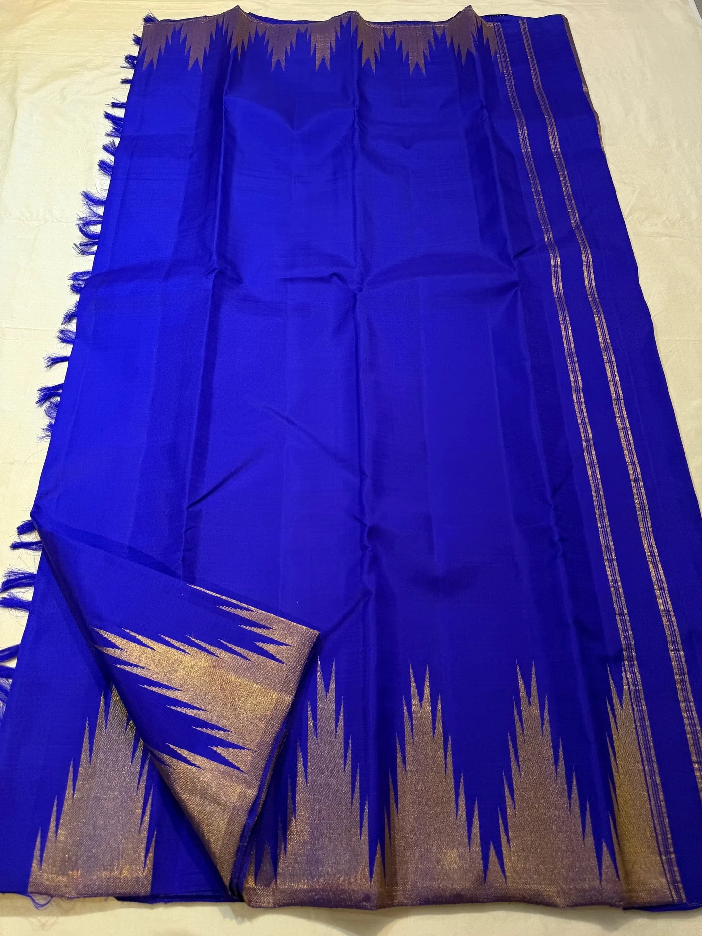 Ettukol flame motifs in antique copper zari on royal blue Kancheepuram silk saree — Idam Living