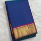 Royal blue Kancheevaram silk saree with magenta zari border and seer pallu – full drape view
