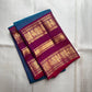 Royal blue handwoven pure silk Kancheepuram saree with magenta Varisaipet border, full front view