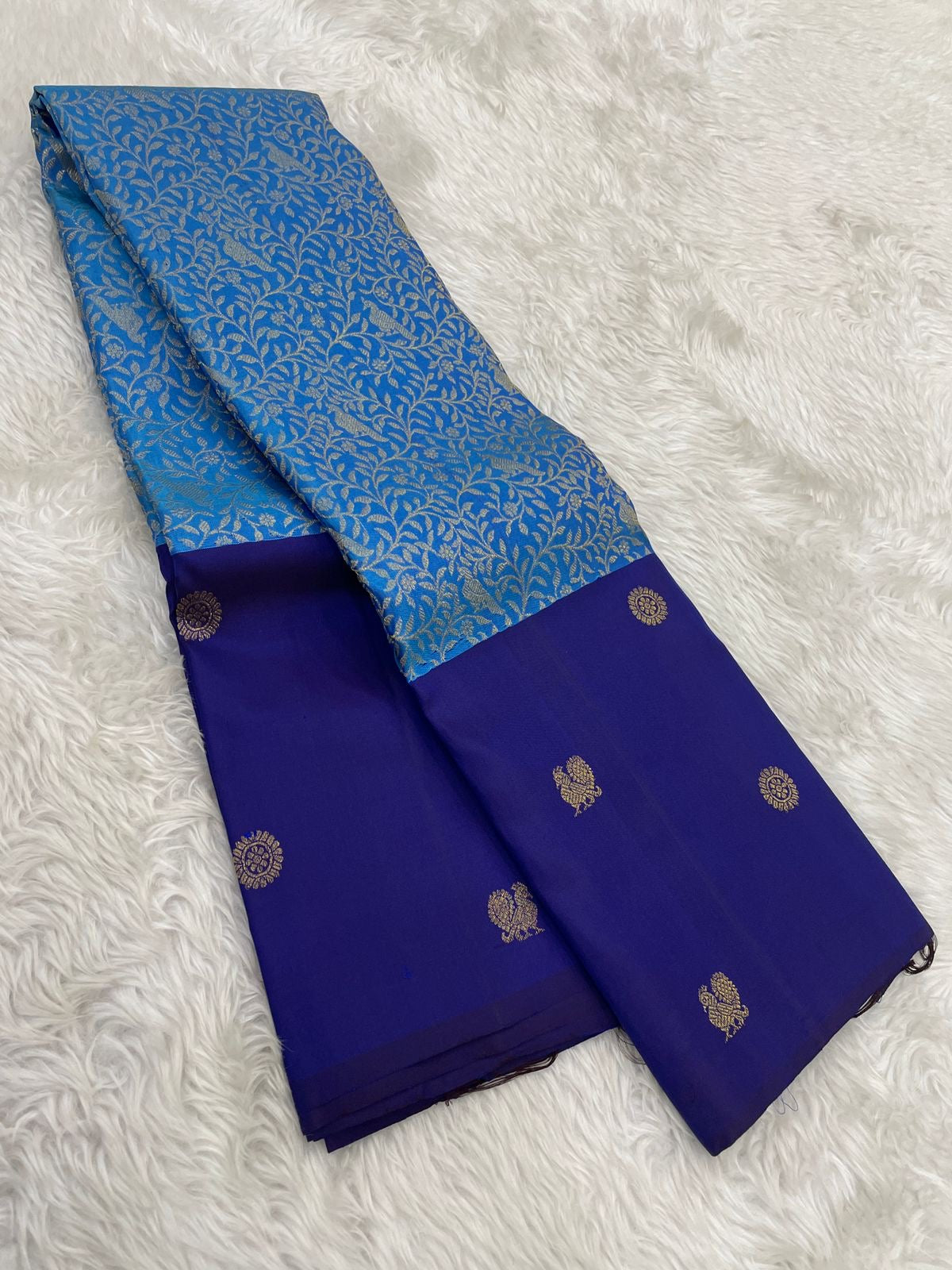 Royal Blue Kanchi Pattu saree with petite Chakram-style gold zari medallions