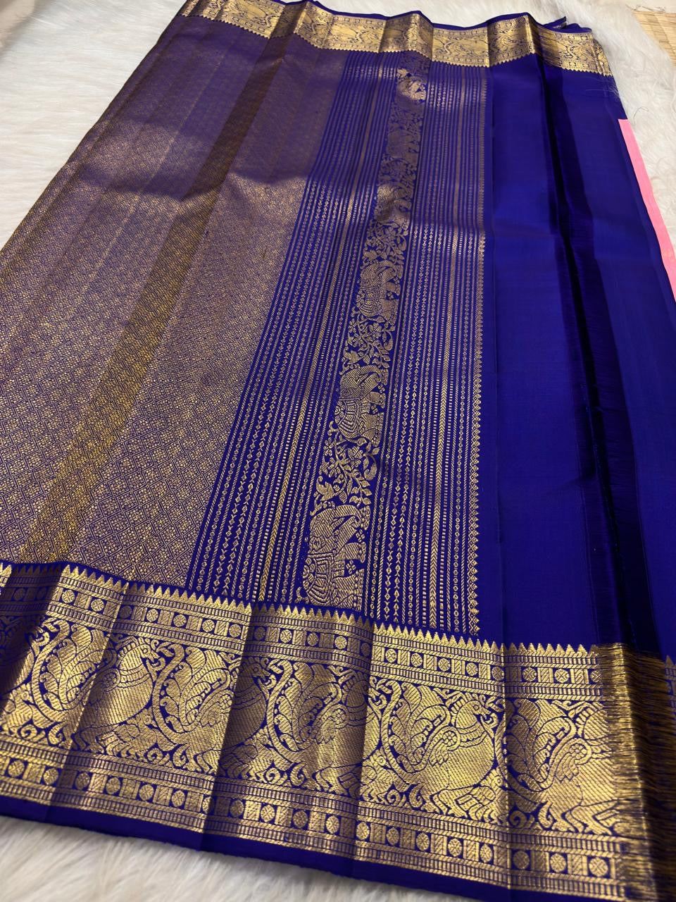Deep Royal Blue Kanchipuram border with grand Mayil gold zari motifs