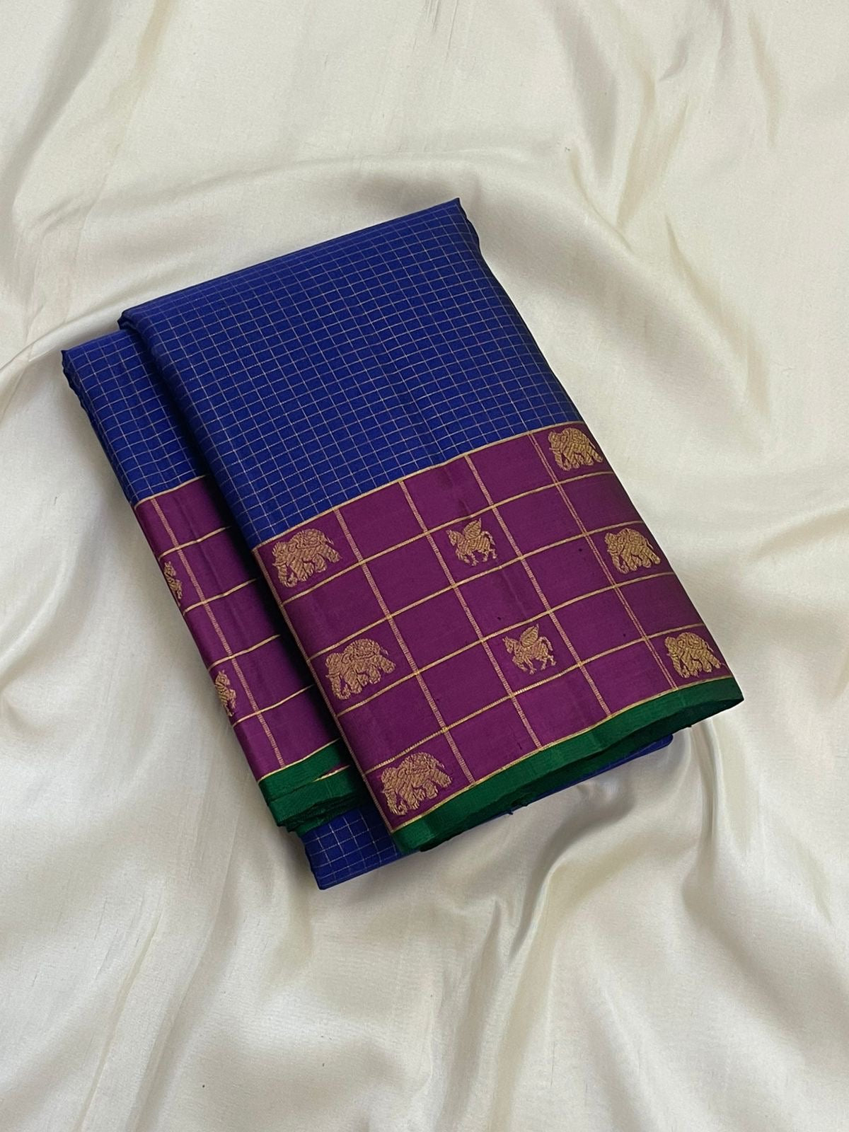 Elephant and horse vanasringaram motifs in gold zari on royal blue zari kattam Kanchipuram saree — Idam Living
