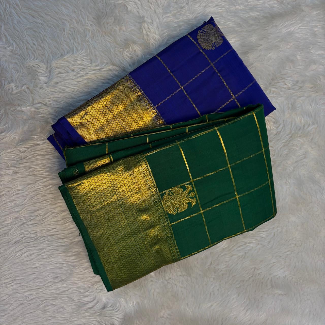 Ornate gold zari pallu close-up on royal blue Kanjivaram handwoven Kanchipuram silk saree — Idam Living