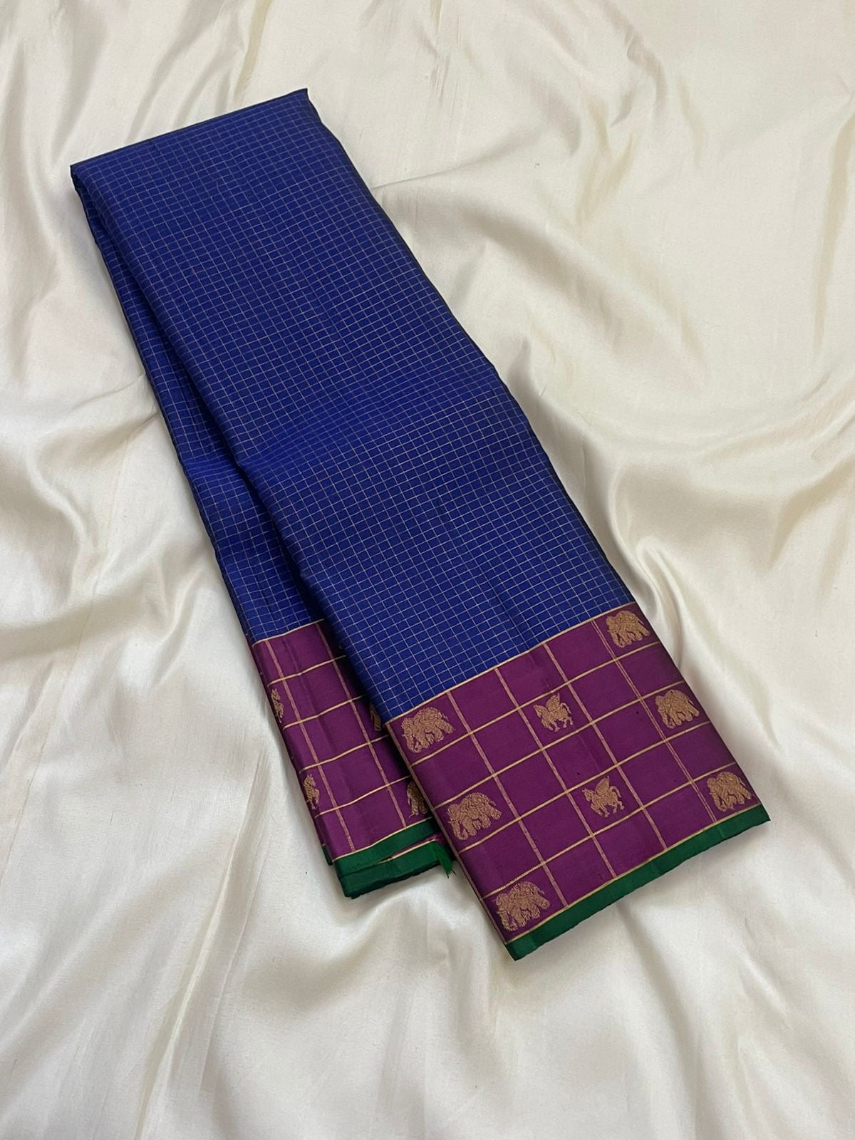 Rich magenta pallu with gold zari vanasringaram motifs on royal blue Kanchipuram silk saree — Idam Living