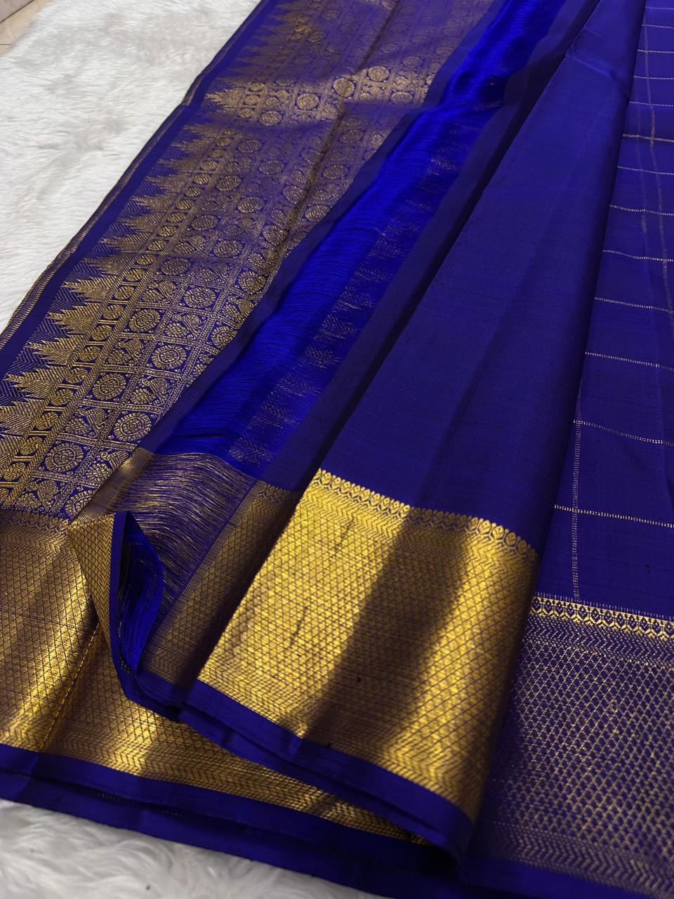 Rich ornate gold zari pallu on royal blue handwoven Kanchipuram silk saree — Idam Living