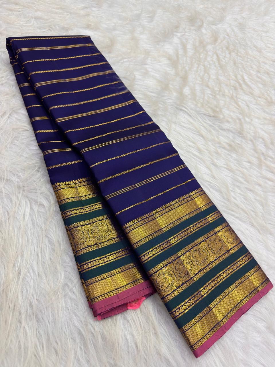 Royal blue Pure Silk Kanchipuram Varisaipet saree with fine twisted gold-zari bands.