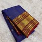 Royal blue handwoven Pure Silk Kanchipuram saree folded to show the ruby red border