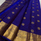 Handwoven Pure Silk Kanchipuram saree with Butta construction and warm gold zari detailing.