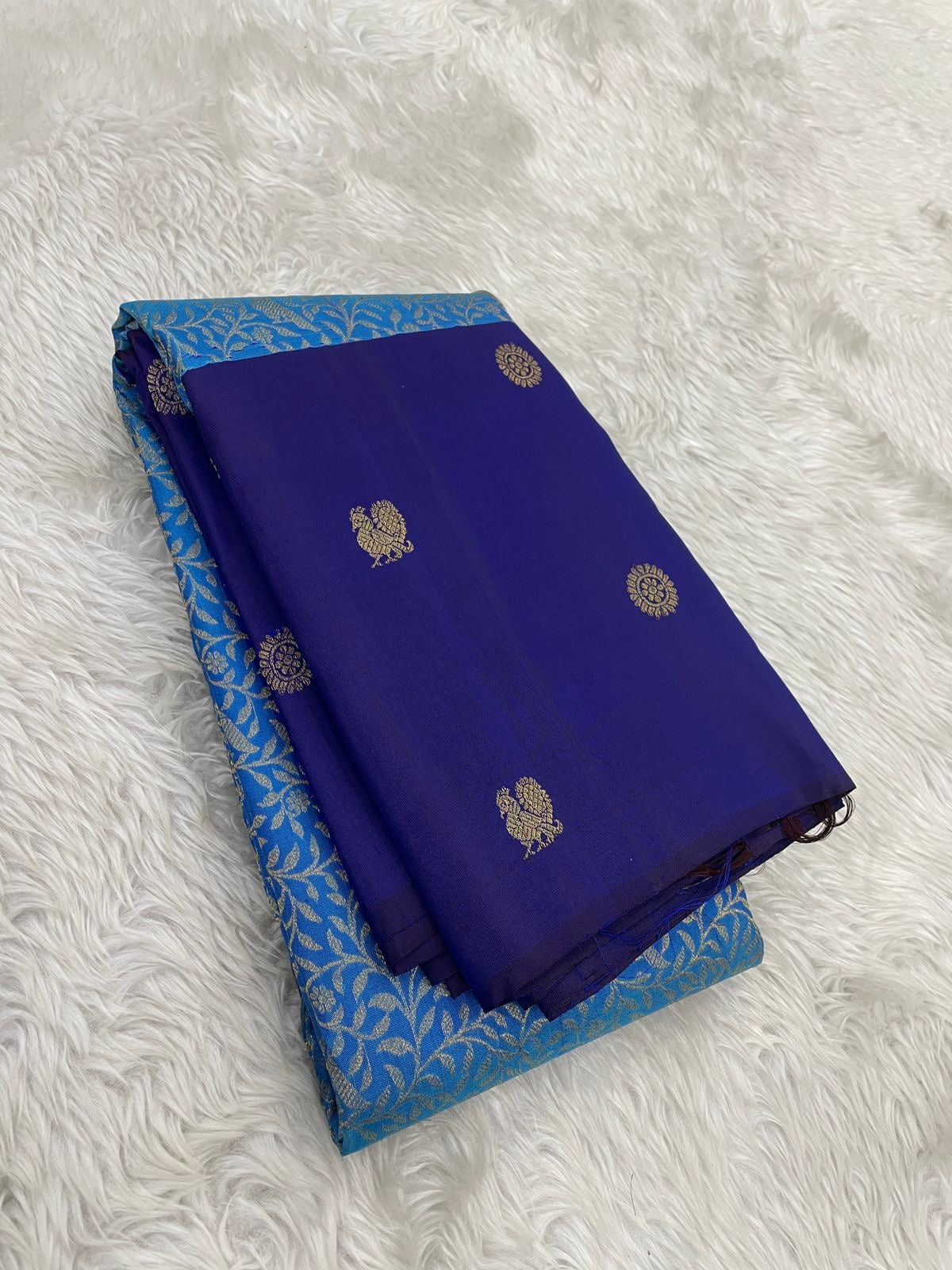 Royal Blue Kanjivaram silk saree with Chakram and traditional figurative zari buttas