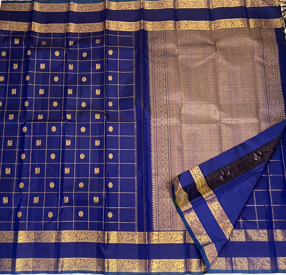 Royal Blue Kanjivaram silk saree with gold zari check pattern and traditional Annam motifs