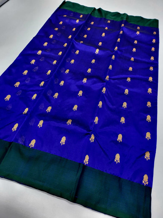 Royal blue Pattu Silk Chanderi saree with gold floral butta and bottle green border — Idam Living