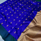 Royal blue body close-up showing gold floral cluster butta