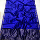 Royal blue Chanderi handloom saree with scattered miniature buttas and metallic weaving.