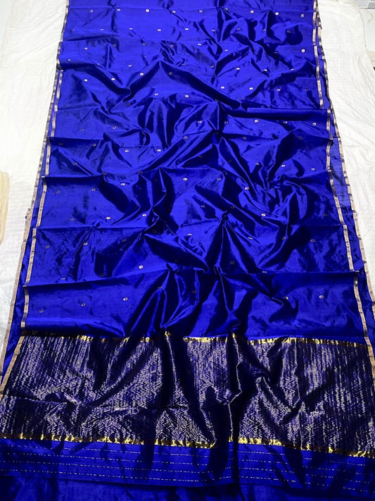 Royal blue Chanderi handloom saree with scattered miniature buttas and metallic weaving.