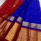Royal Blue Kanchipuram silk body with small spaced circular gold zari buttas.