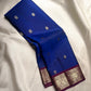 Royal Blue pure silk Kanjivaram Butta saree with Vadamalli Purple contrast border.