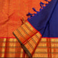 Royal-blue Pure Silk Kanjivaram Varisaipet saree with a burnt-orange contrast border and classic-gold zari.