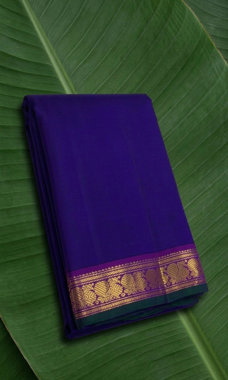 Royal indigo blue and magenta Korvai Kanchipuram silk saree – front drape view