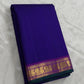Royal indigo Kanjivaram silk saree with magenta mayil border – full length view