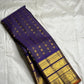 Folded body view showing fine zari lines and small circular gold buttas on Royal Indigo Violet silk