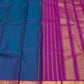 Handwoven Kanchipuram silk saree royal ink blue with korvai border – drape detail