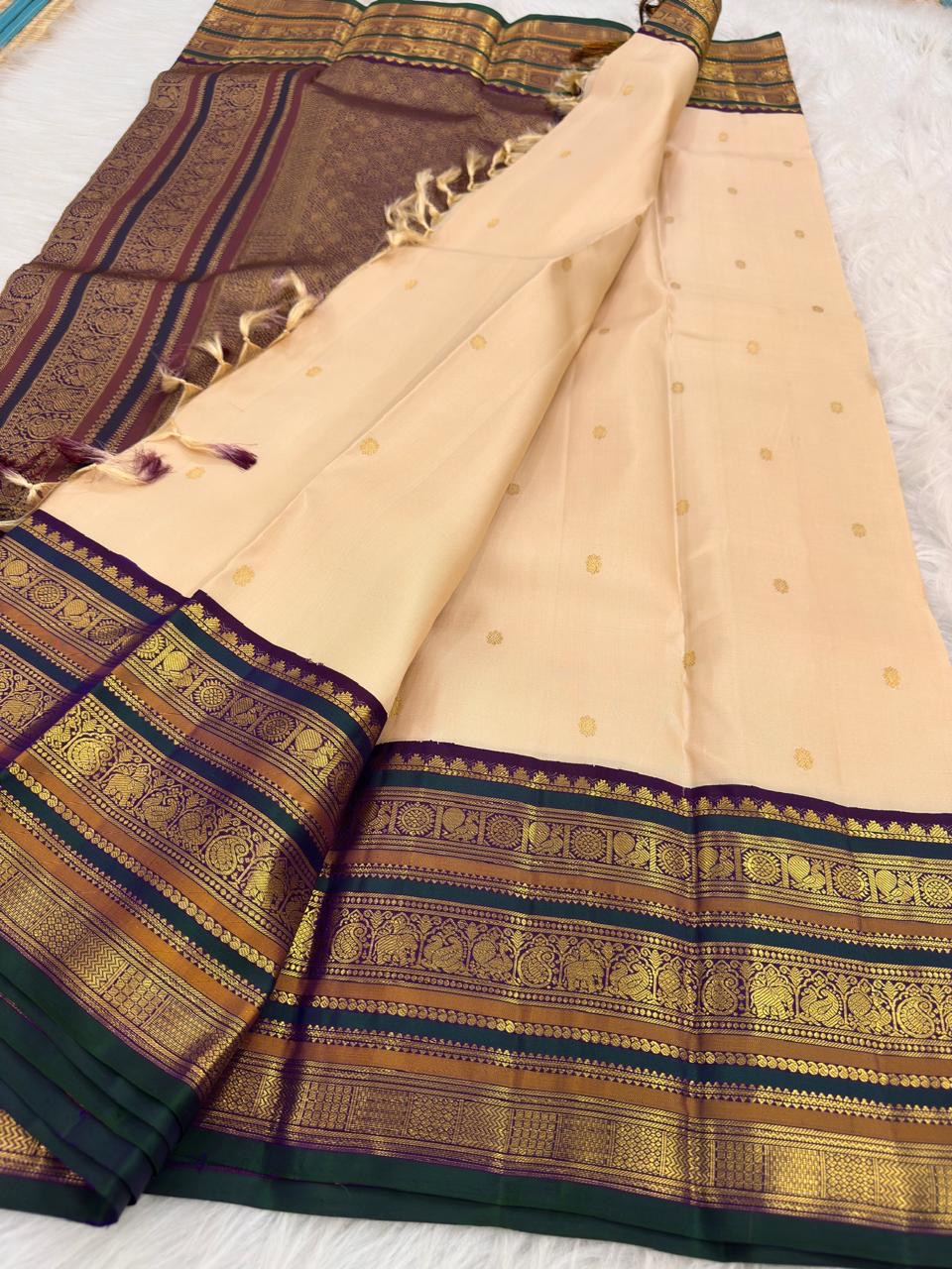 Close-up of royal ivory pure mulberry silk body with gold zari buttas, KanchiPattu Varisaipet saree