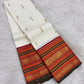 Close-up of pillar box red and burnt orange Varisaipet border on Royal Ivory Kanchipuram saree