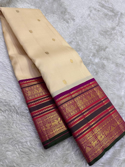 Royal Ivory Kanchipuram silk saree – Jewel Magenta Korvai zari border detail — Idam Living