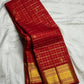 Imperial ruby Kanjivaram silk saree with diamond kamalam butta motifs and gold zari weave