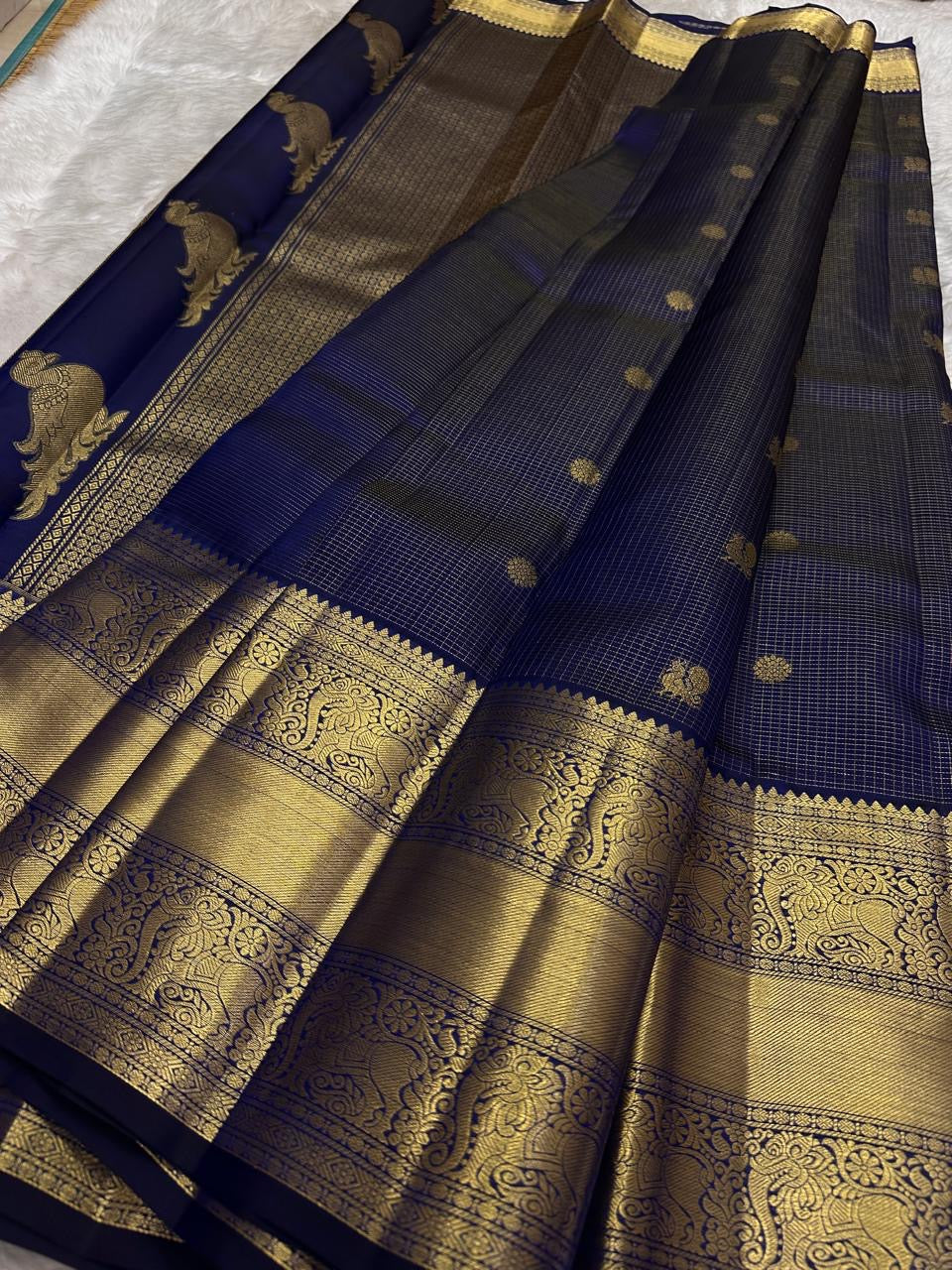 Royal navy Kanchi Pattu saree with Zari Kattam weave and ornate Yazhi border — Idam Living